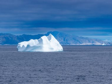 Iceberg floating in the sea but what's under it